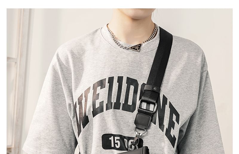 BagBuzz - Crossbodytas met driehoekmotief en klep