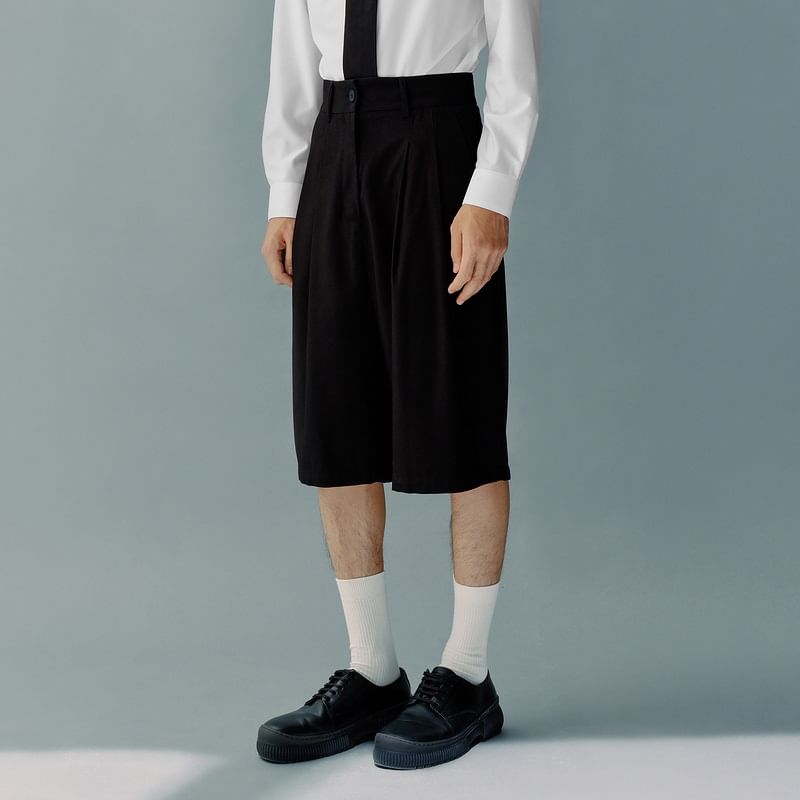Adotuastic - Capri-broek met middelhoge taille en effen stof