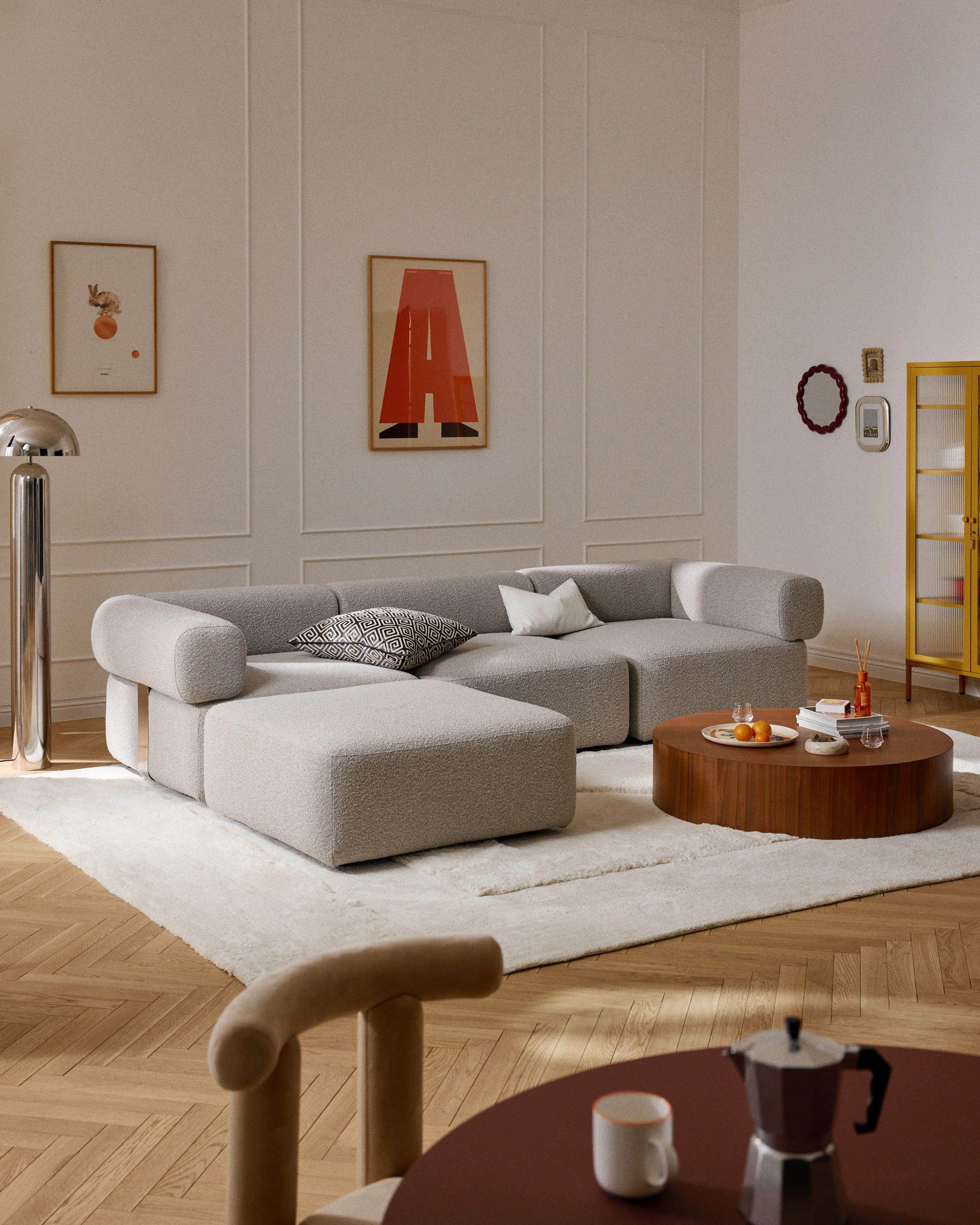 Modulaire bank Anton (4-zits) met poef (links/rechts) van bouclé