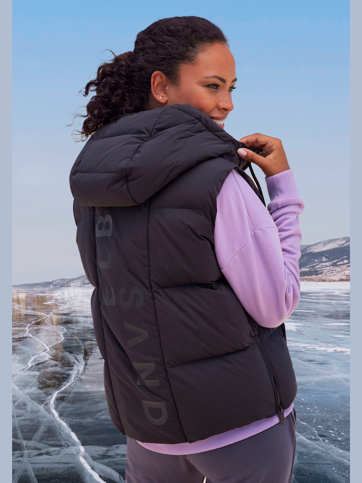 Gilet matelassé doublé avec capuche réglable