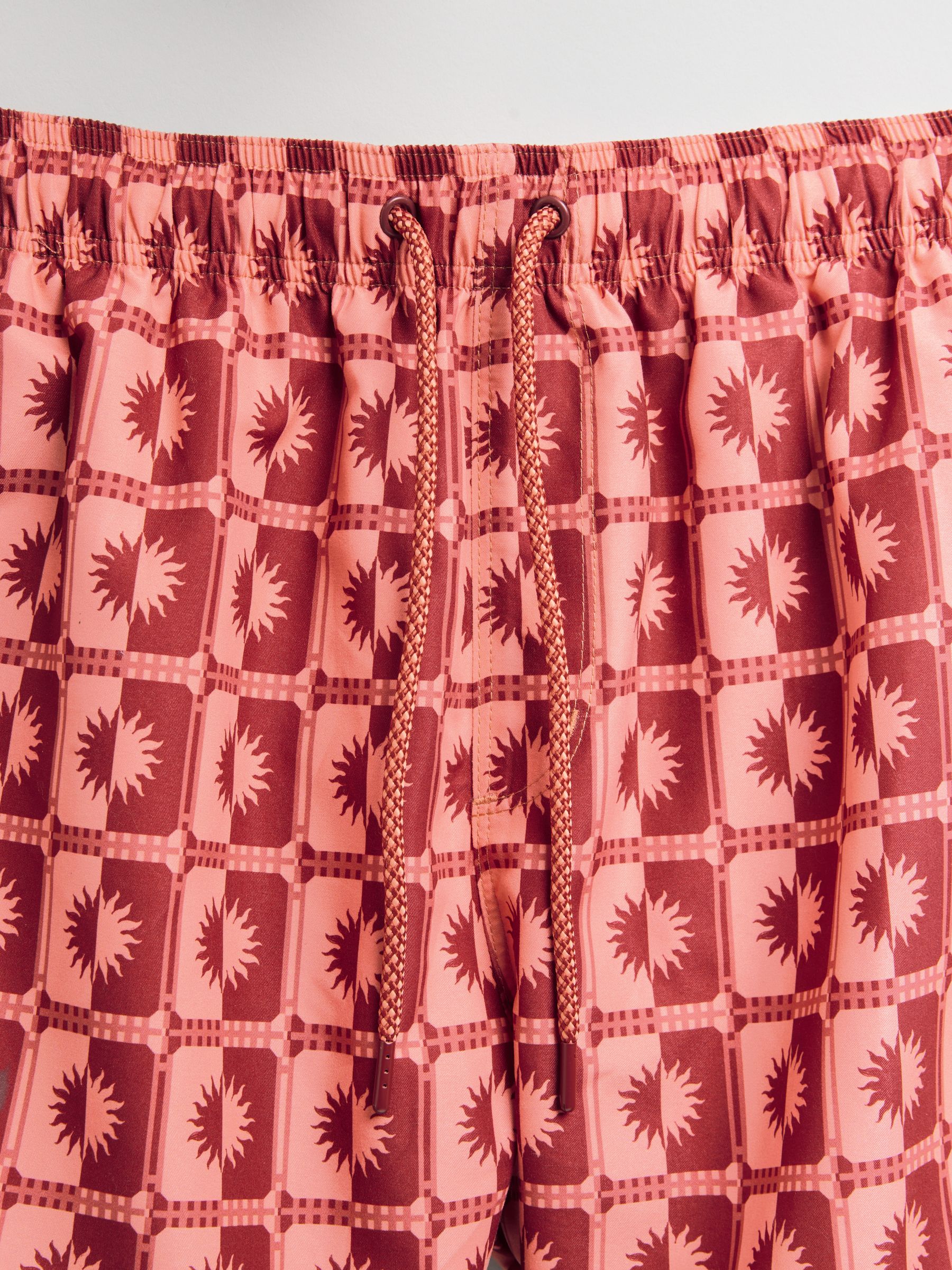 Koraalroze geometrische zon - Zwemshort met print