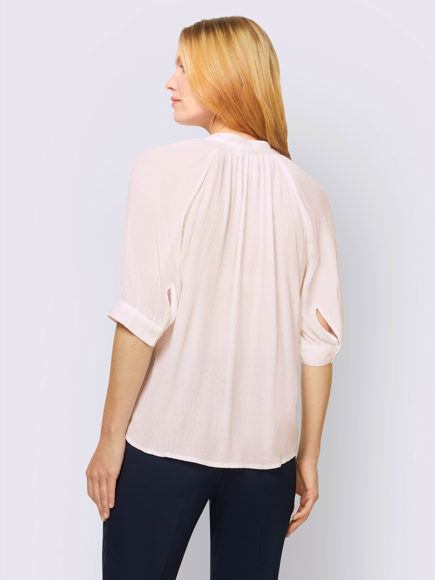 Chemisier look tendance avec ourlet arrondi