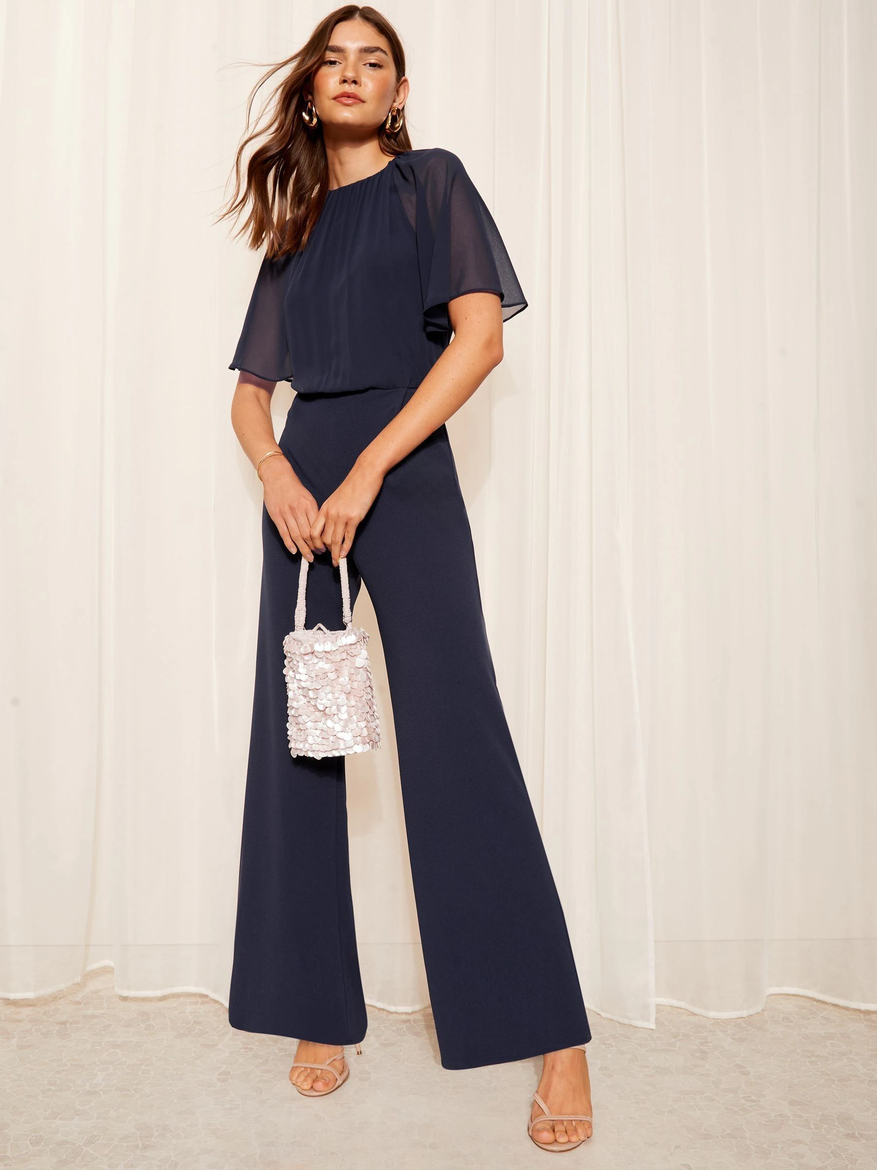 Donkerblauw - Friends Like These - Chiffon jumpsuit met uitlopende mouwen en wijde pijpen