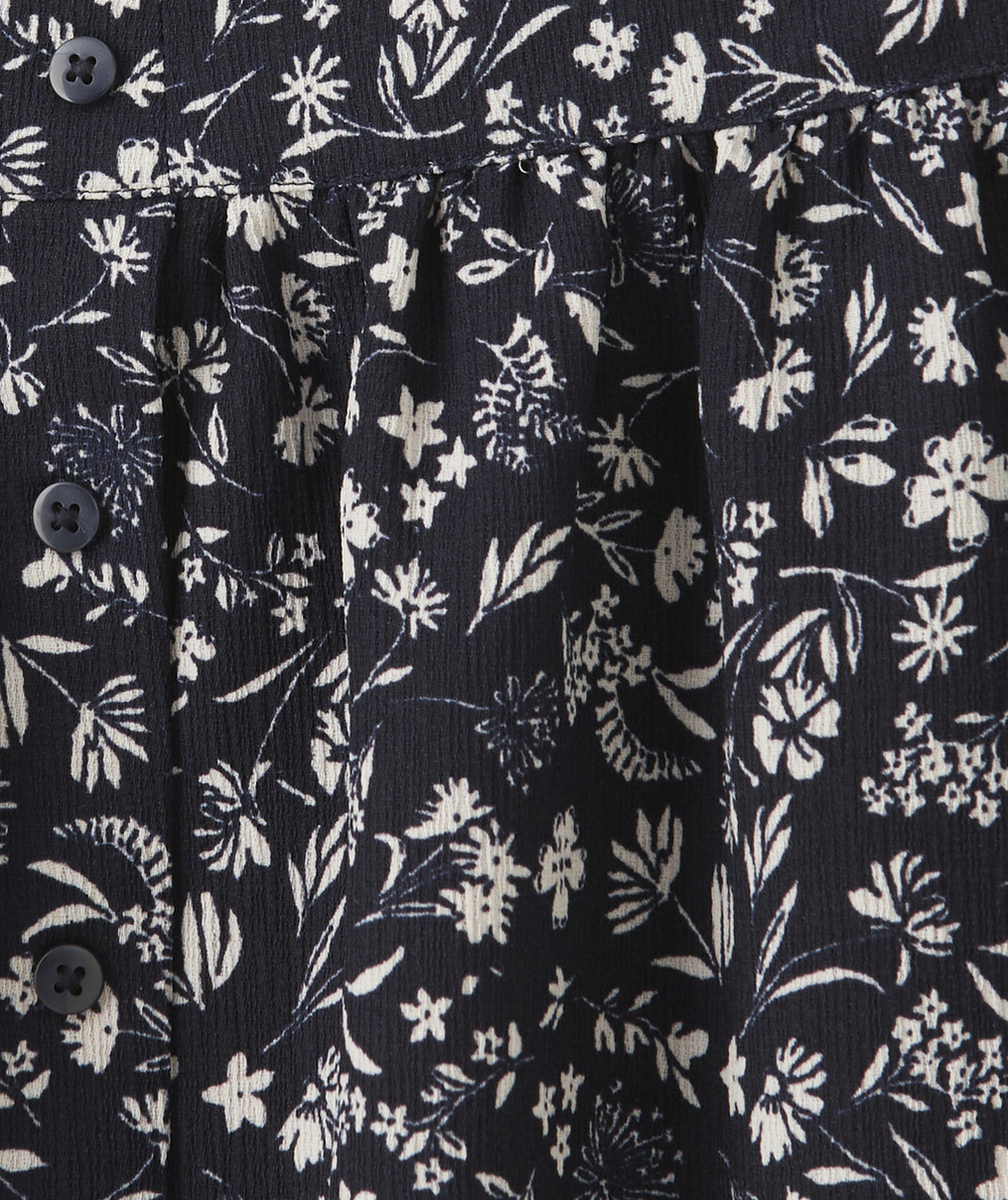 JUPE BOUTONNÉE FILLE EN FIBRES RECYCLÉES BLEU MARINE ET IMPRIMÉ FLEURI BLANC