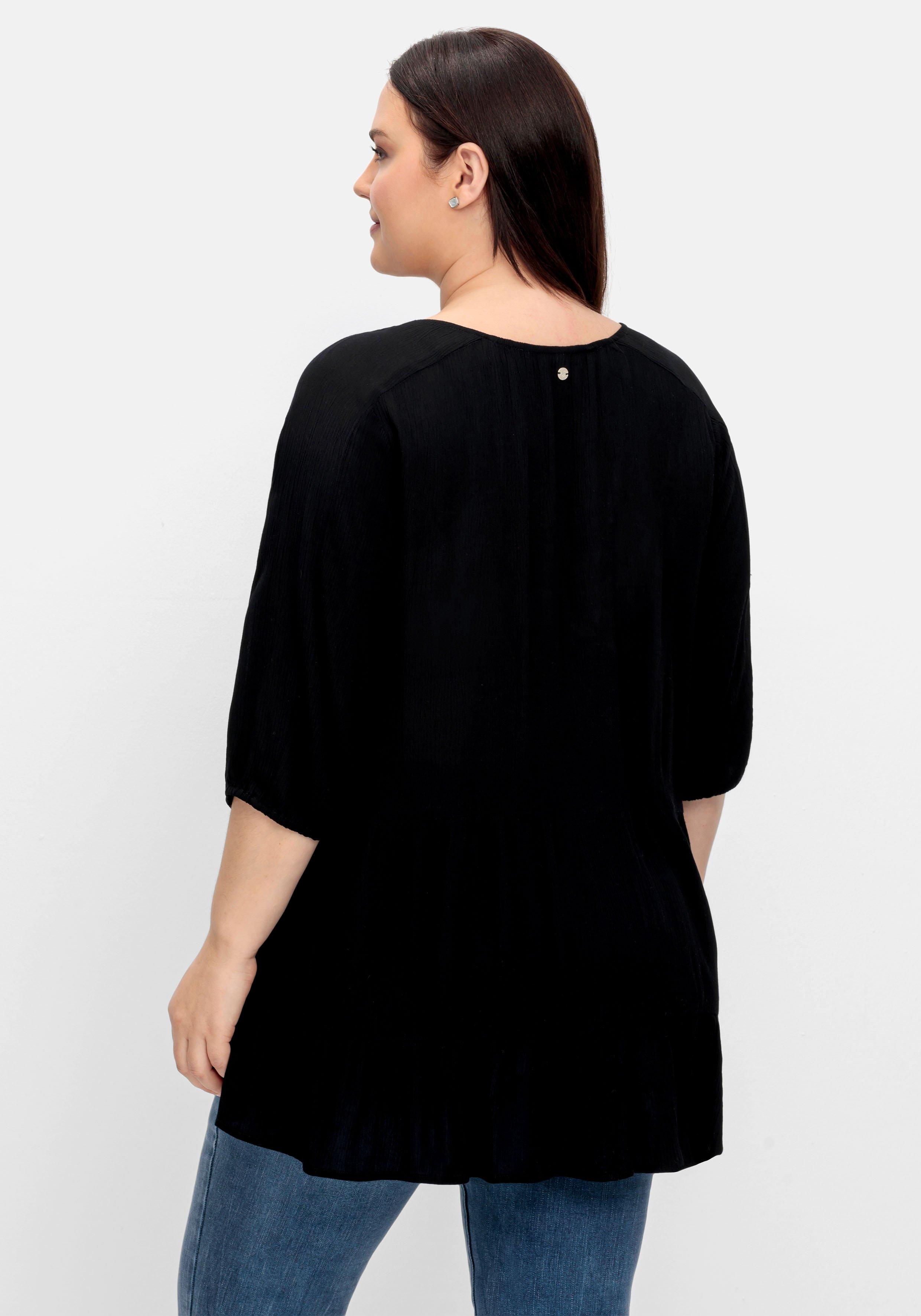 Bluse aus Crêpe, mit Volants am Saum
