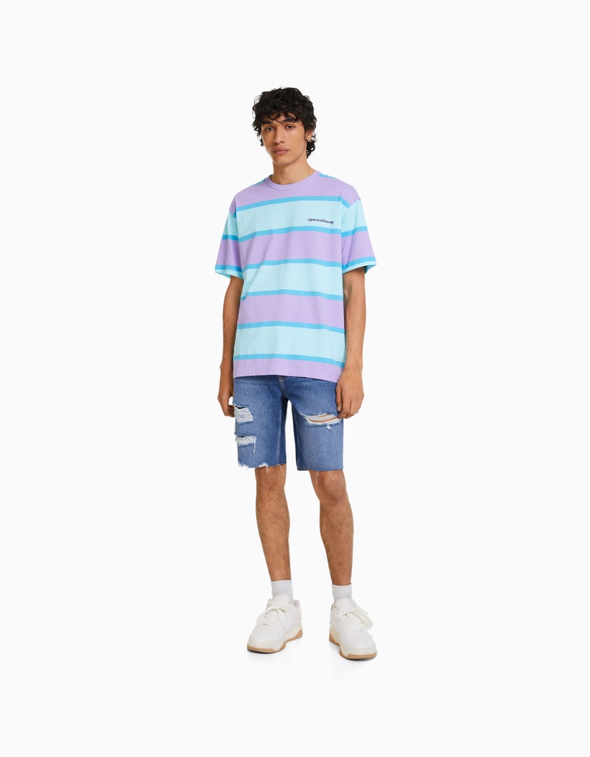 Bermuda jeans rasgada de corte justo