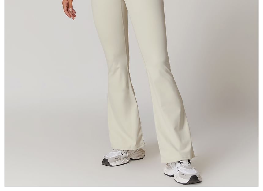 Skinniano - Haltertop met effen padding en open rug, cropped sporttop