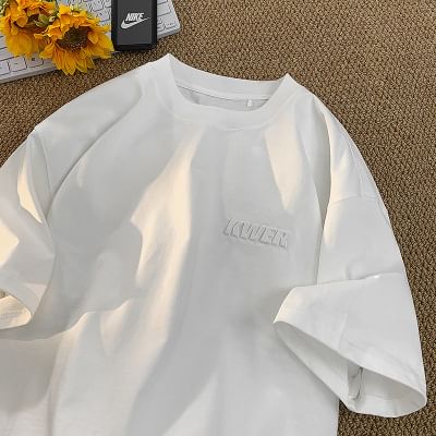 FOEV - T-shirt met ronde hals en elleboogmouwen en belettering