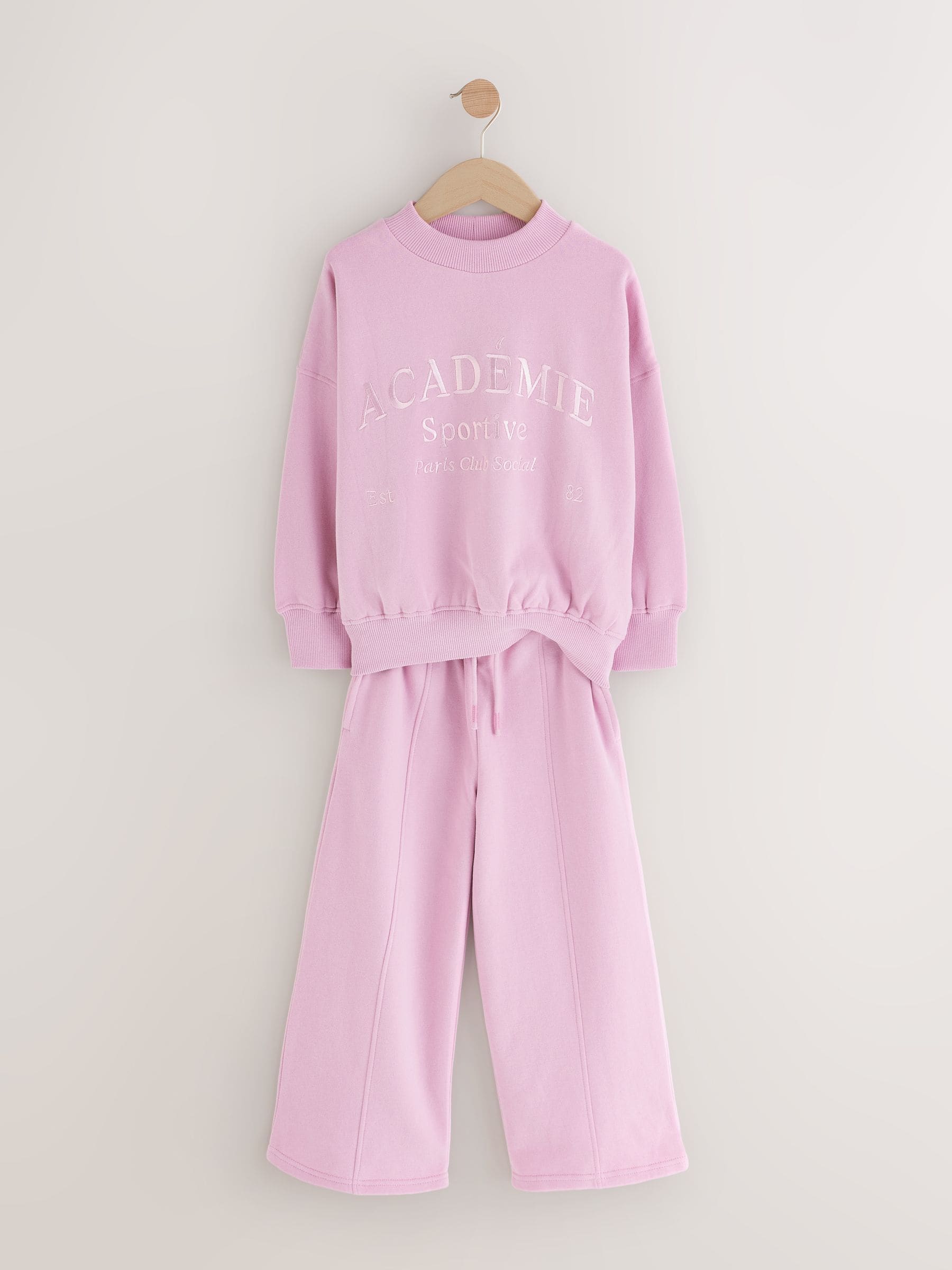 Roze met slogan - Set van sweatshirt en joggingbroek met wijde pijpen (3-16jr)