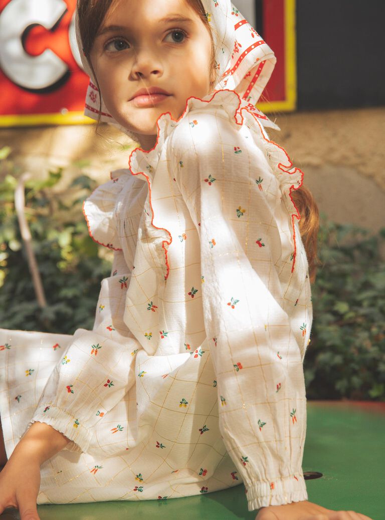 Robe écrue à volants