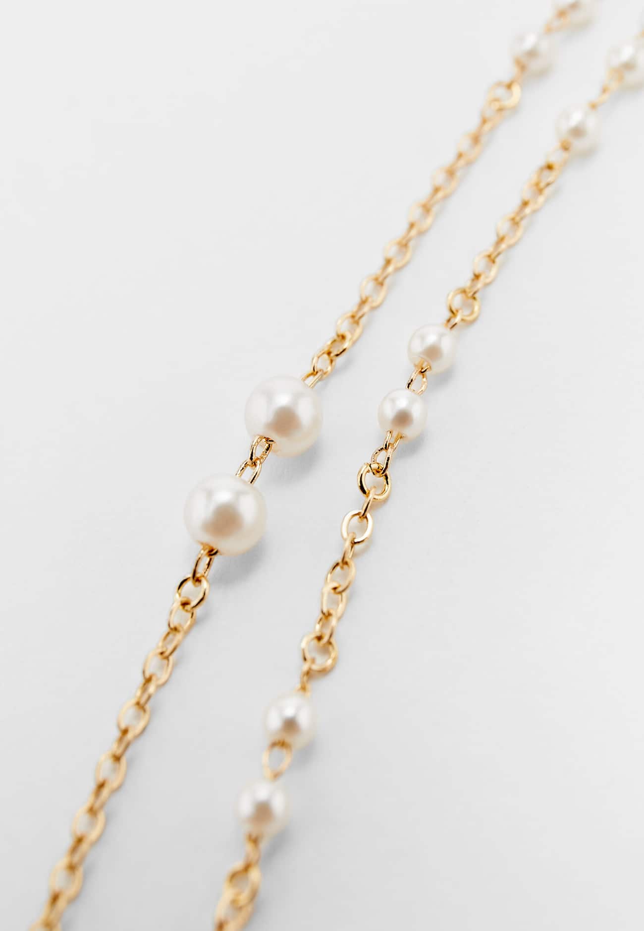 Brincos de corrente com pérolas