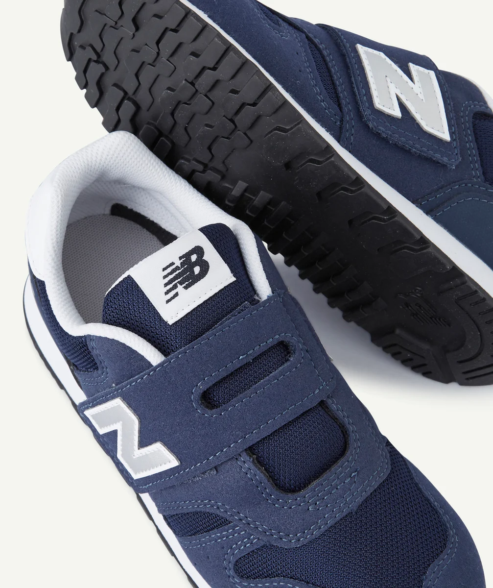 NEW BALANCEBASKETS 373 BLEUES ET BLANCHES AVEC LOGO COULEUR ARGENTÉE