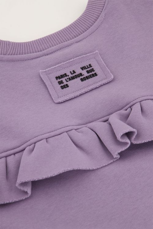 Lila sweater met ruffle en patch