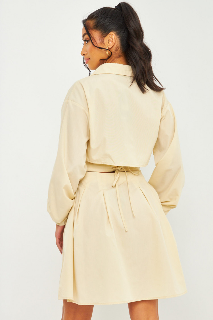 Robe beige ajourée dans le dos effet corset