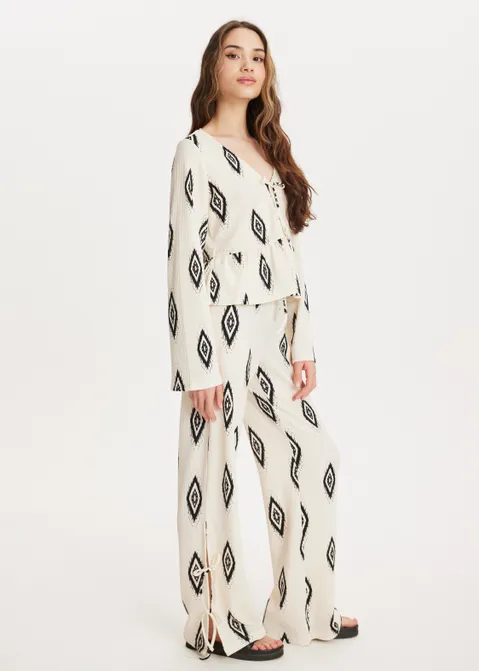 Palazzo broek met strikjes off-white (ECRU)