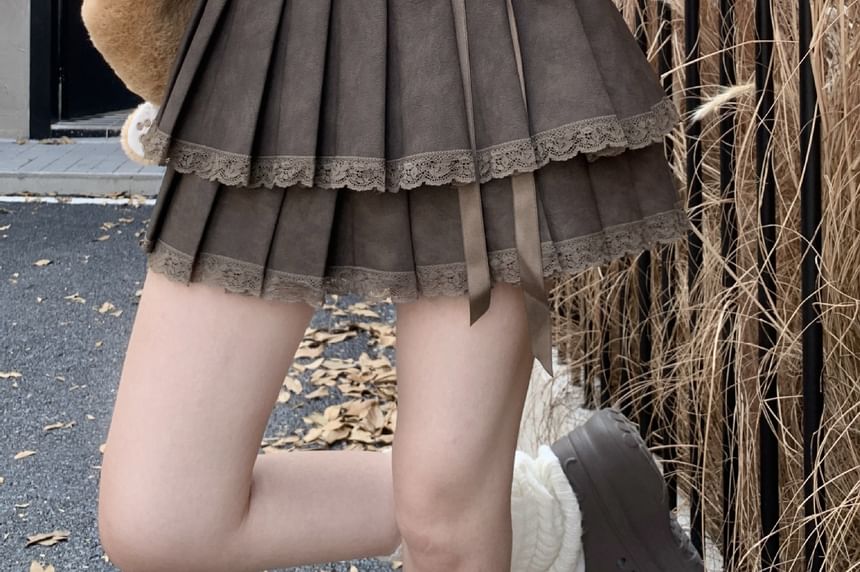 Trendycas - Mini A-lijn rok met hoge taille, strik, plooien en kanten rand