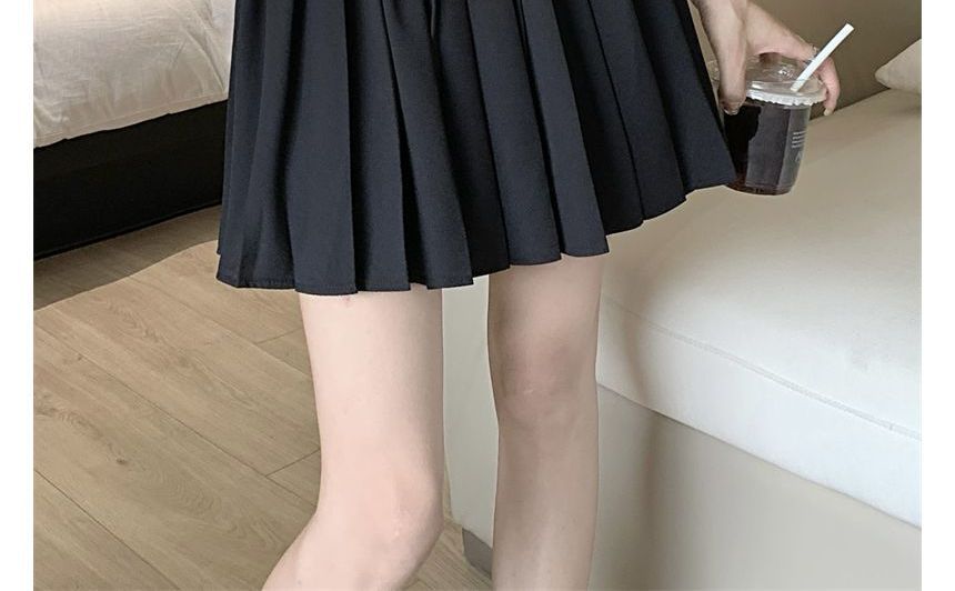 Dandijoy - Minirok met hoge taille en trekkoord, effen en geplooid