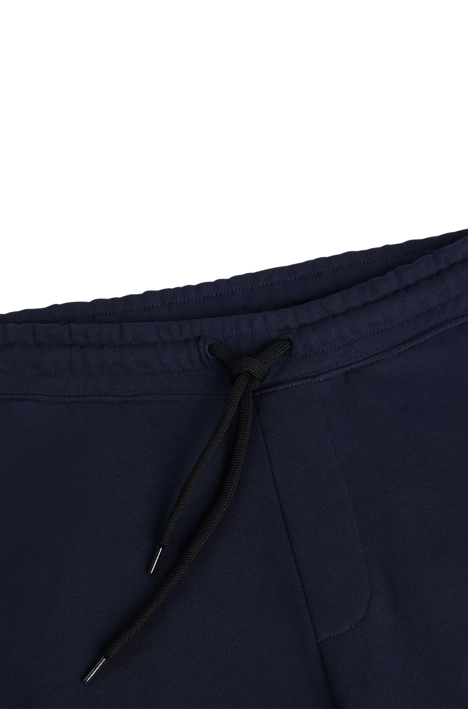 Calça de fato de treino HUGO com punhos vermelhos em tecido felpudo francês e logótipo contrastante.