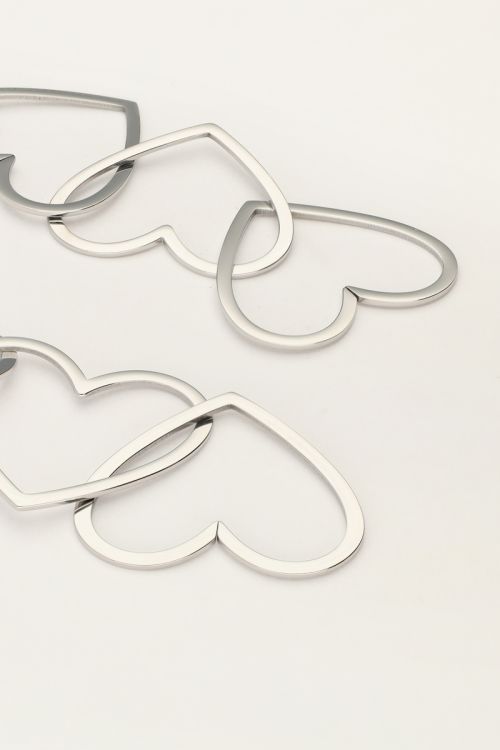 Statement oorhangers met open hartjes
