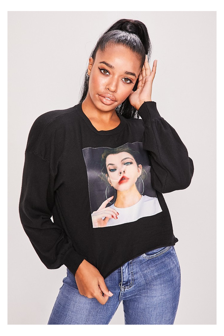 Pull noir tête de femme