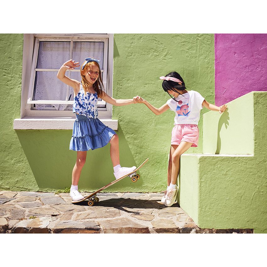 Jupe courte volantée taille smockée pour fille - Bleu