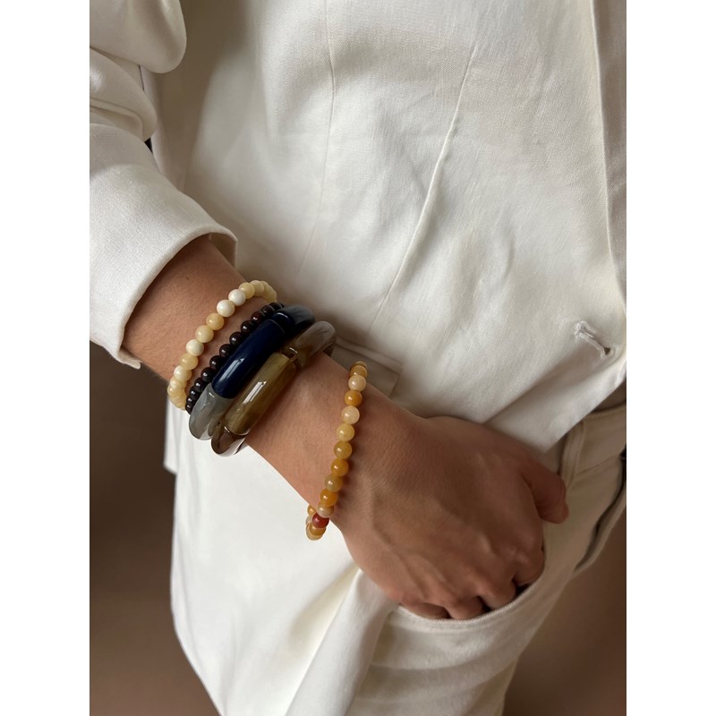 Conmé<br>Armbånd Puzzle