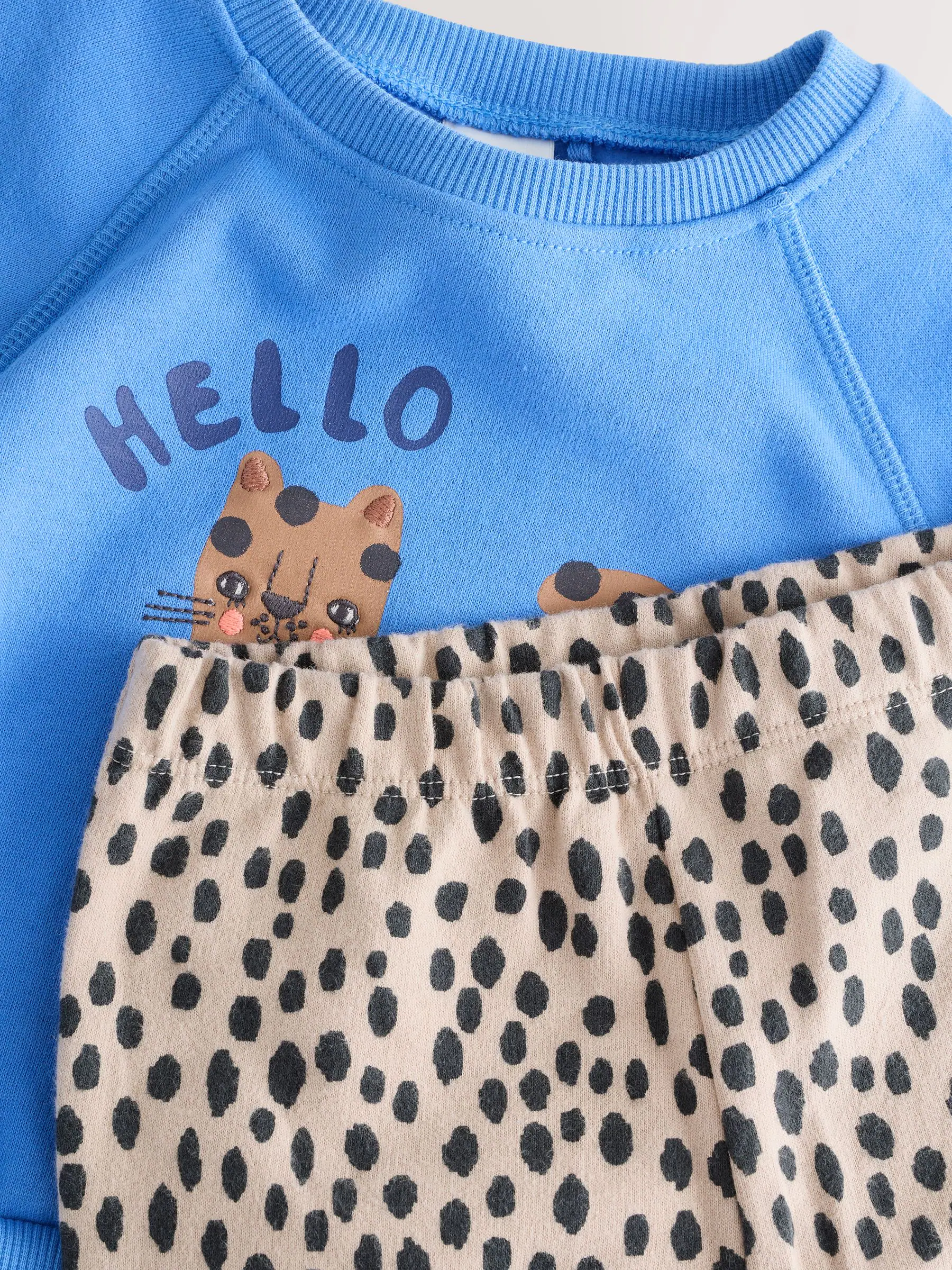 Blauwe dierenprint - Set van sweatshirt en broek met wijde pijpen (3mnd -7jr)
