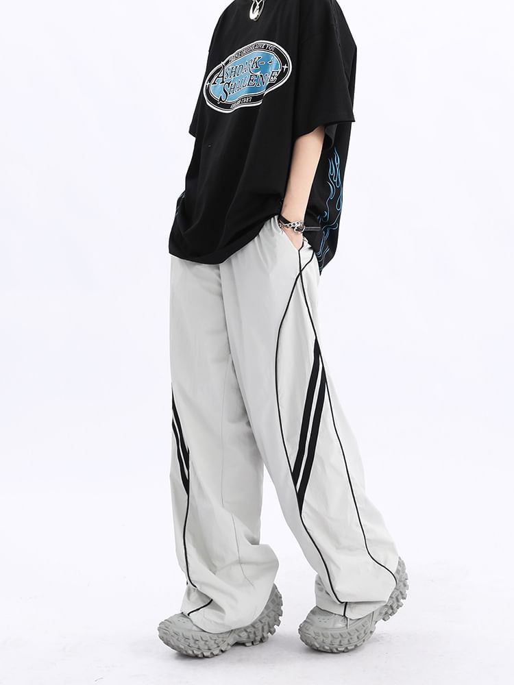 Rosesand - Lage taille gestreepte losse wijde joggingbroek