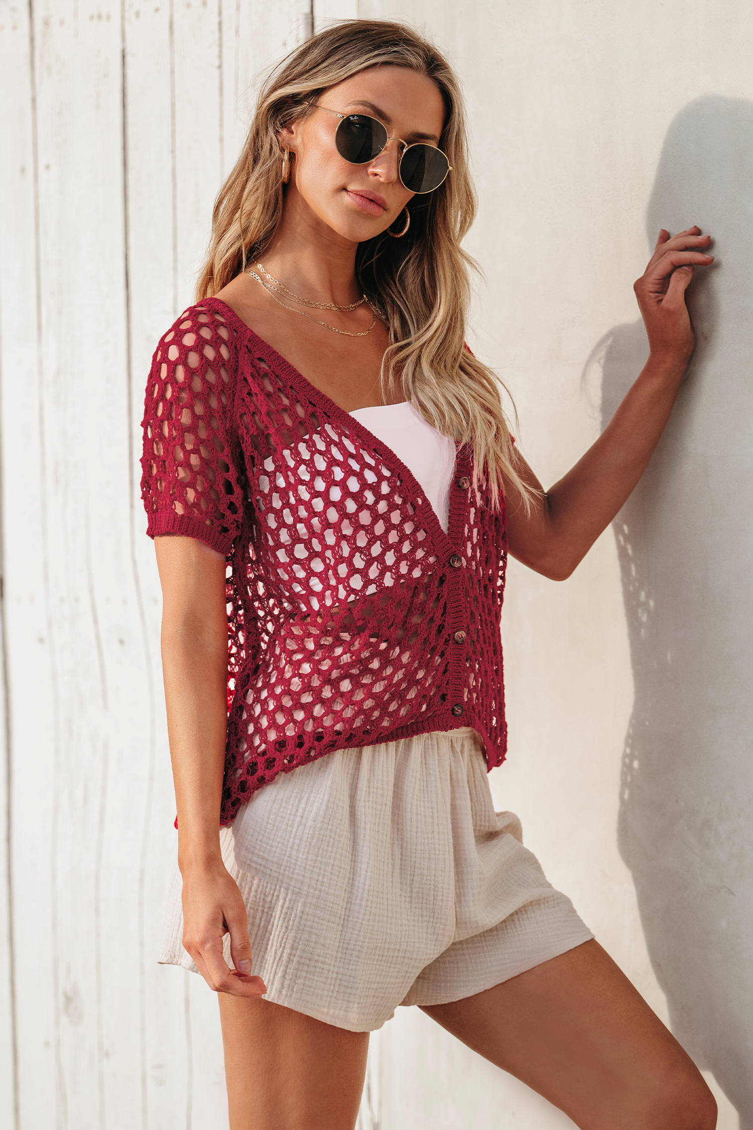 Haut cover up en tricot ouvert à boutons sur le devant
