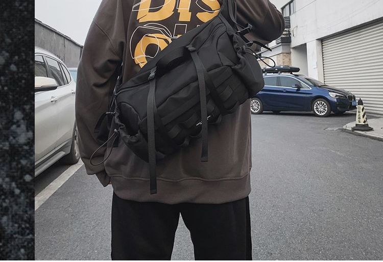 SUNMAN - Effen nylon crossbodytas