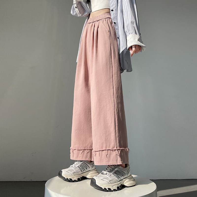 Tel tot 10 - Elastische taille, effen wijde broek