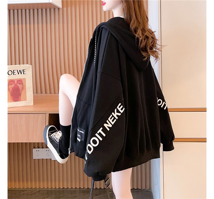 Carotaine - Oversized hoodie met rits en letters