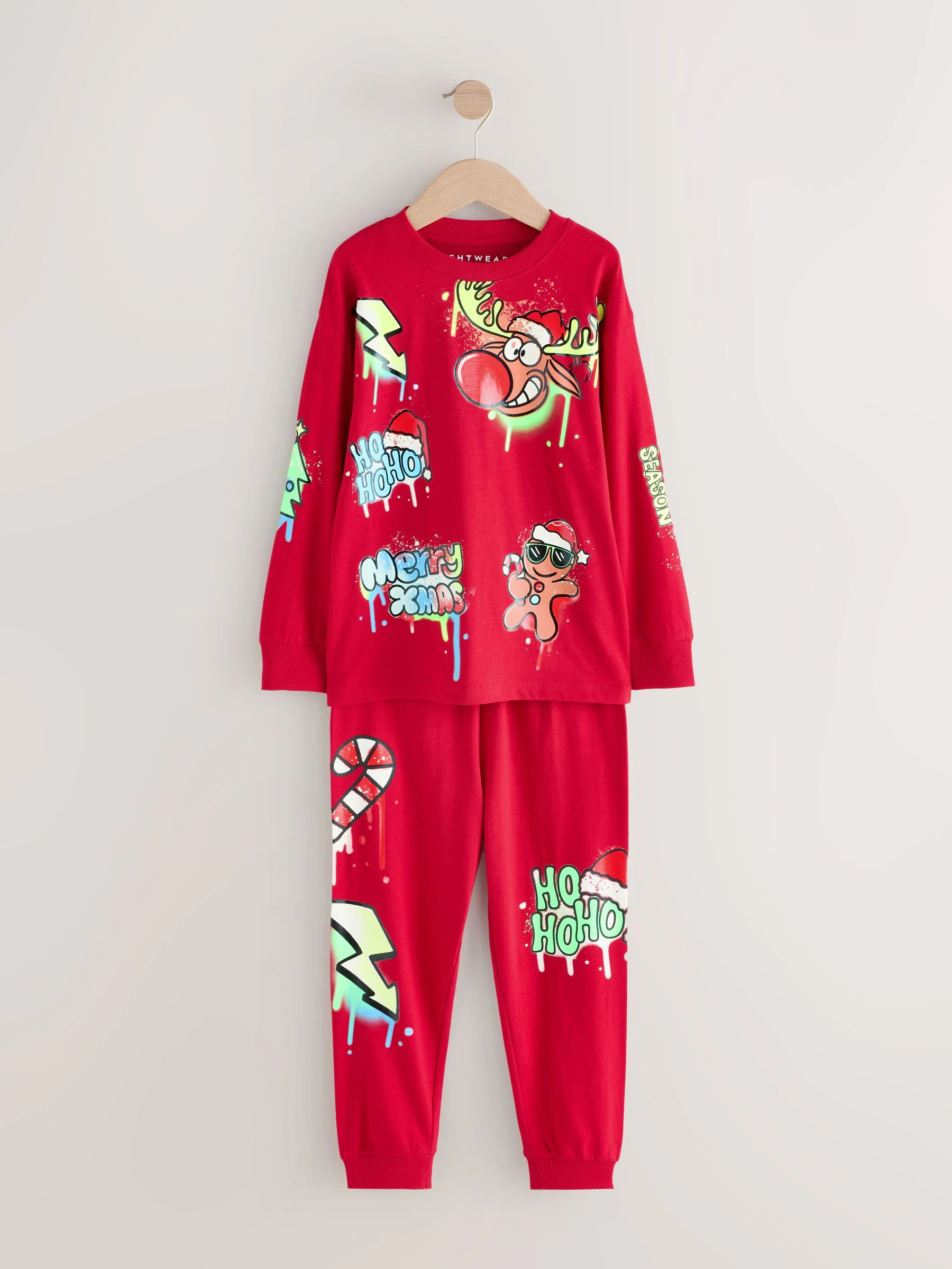 Zwart/rood/geel graffitiprint - Enkele kerstpyjama (3-16jr)