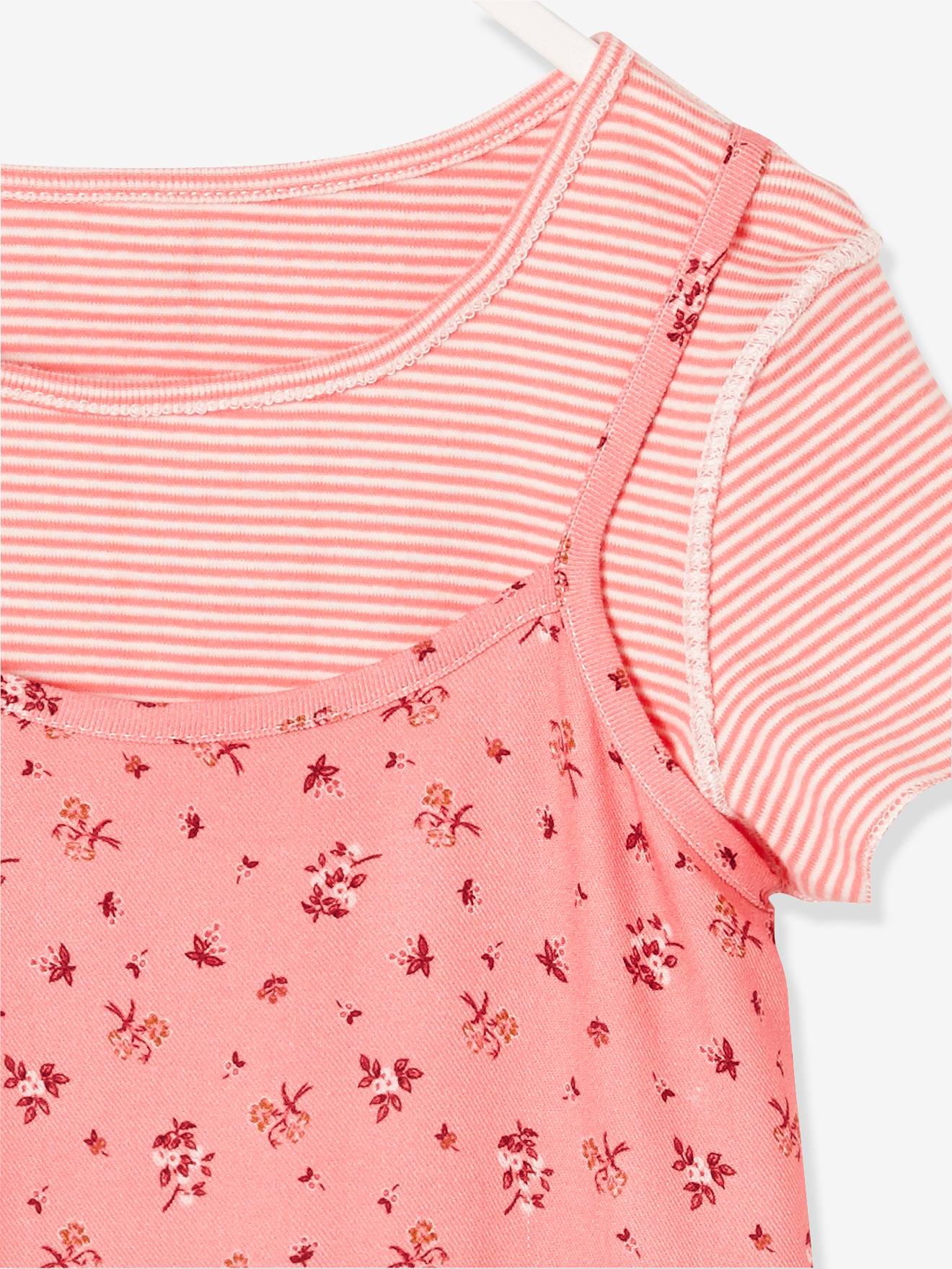 Vestido reversível para meninas em dois tecidos estampados rosa claro.