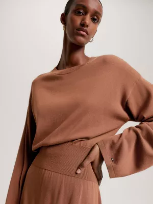 Vestido midi folgado com cintura marcada em jérsei