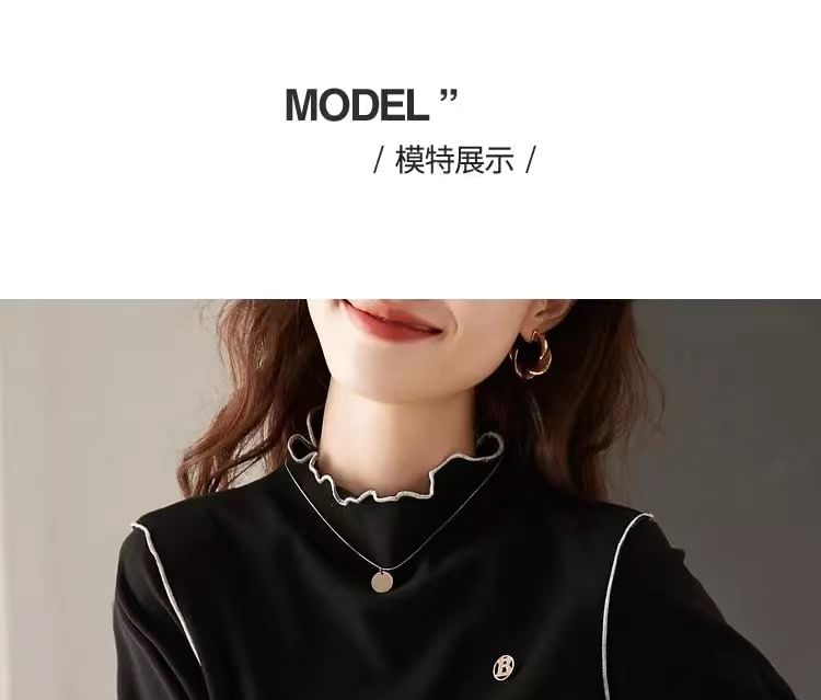 Jeonseon - T-shirt met lange mouwen, hoge hals en contrasterende rand
