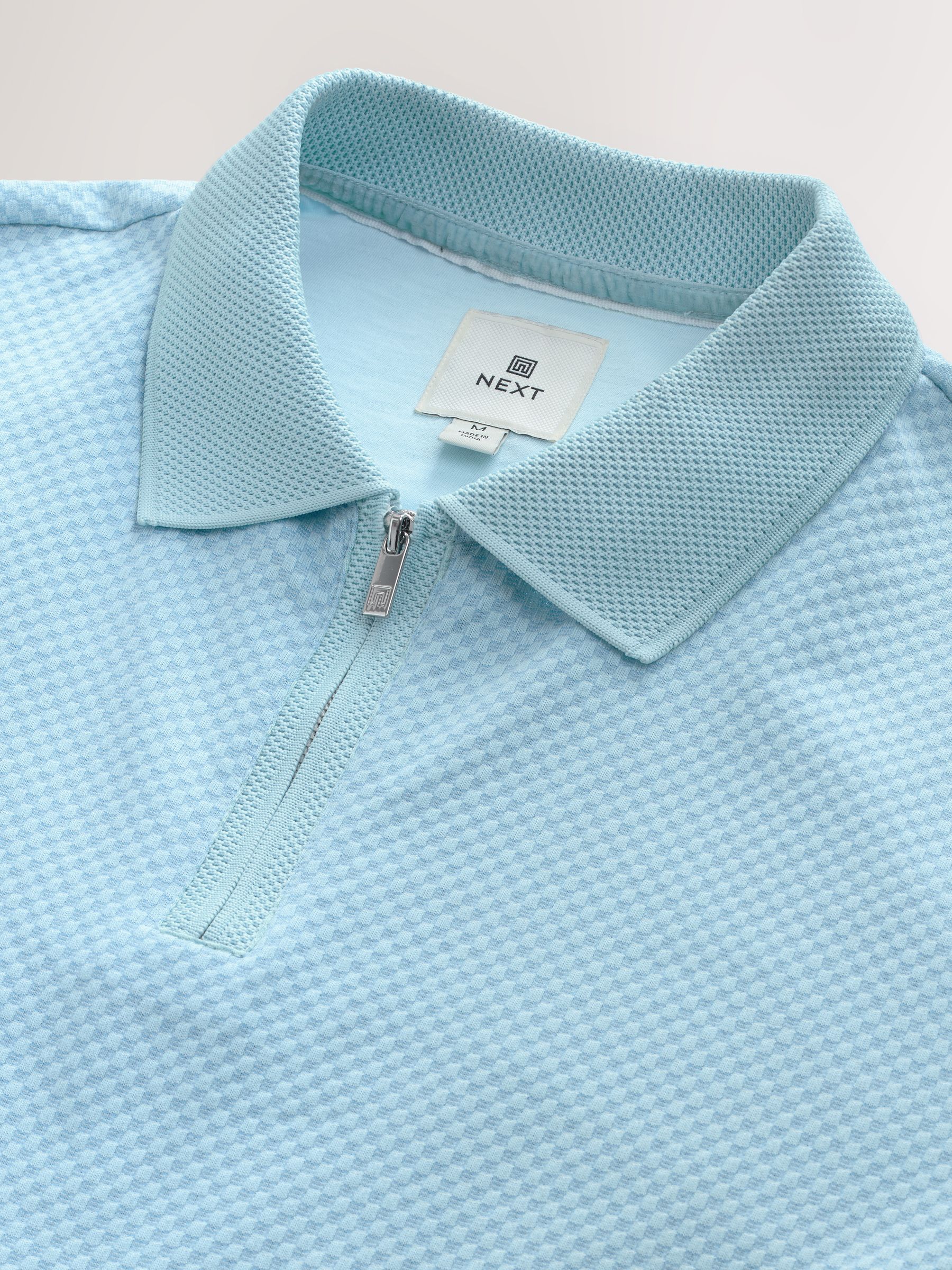 Blauw - Modieus poloshirt met kwartrits