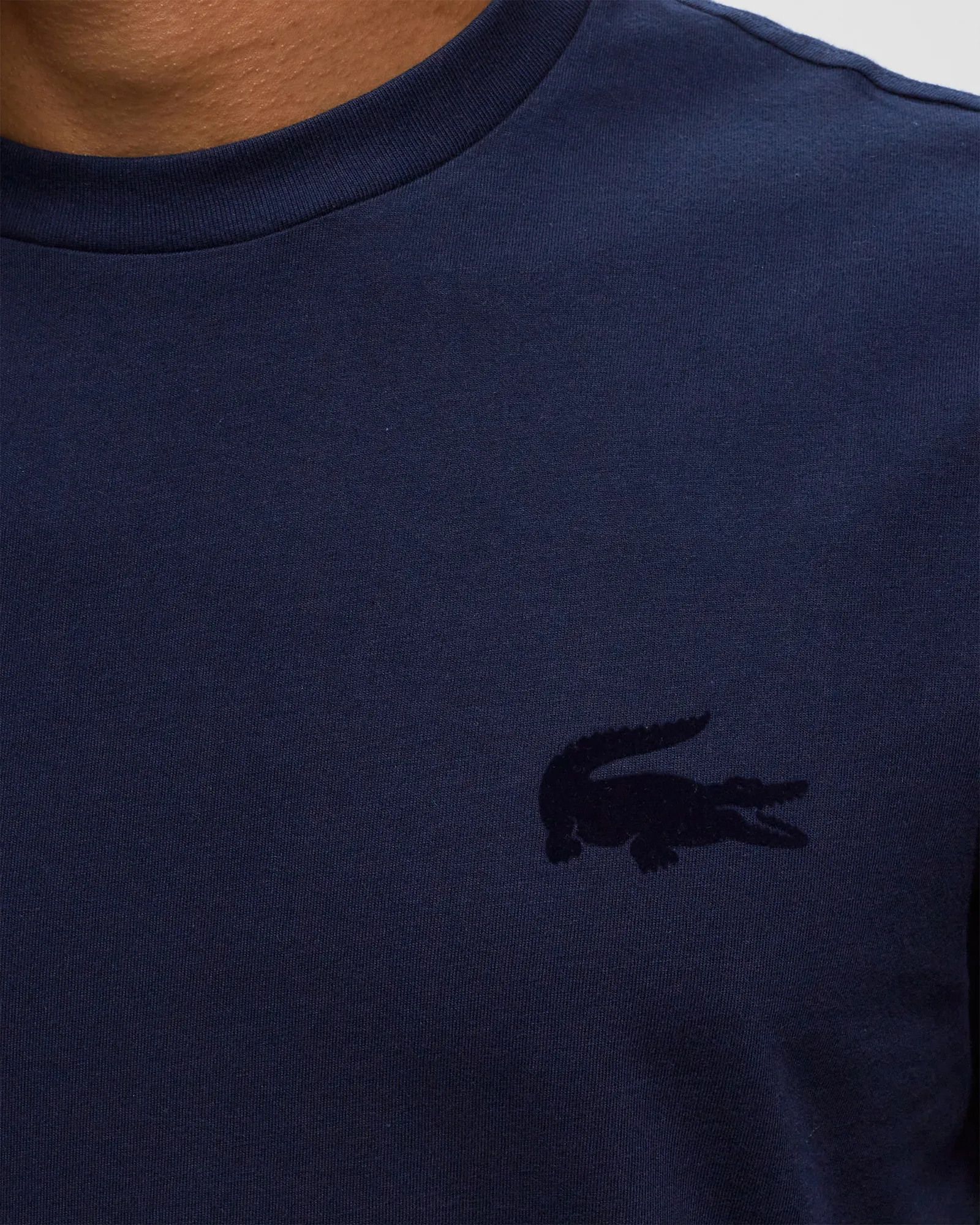 Camiseta Lacoste para usar em casa