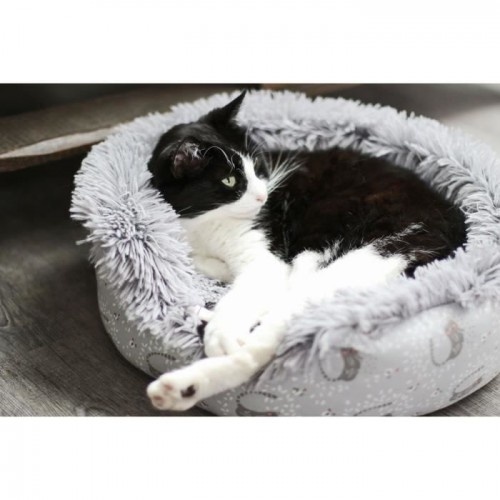 Cama redonda AIME em couro bege para animais de estimação de pequeno porte.