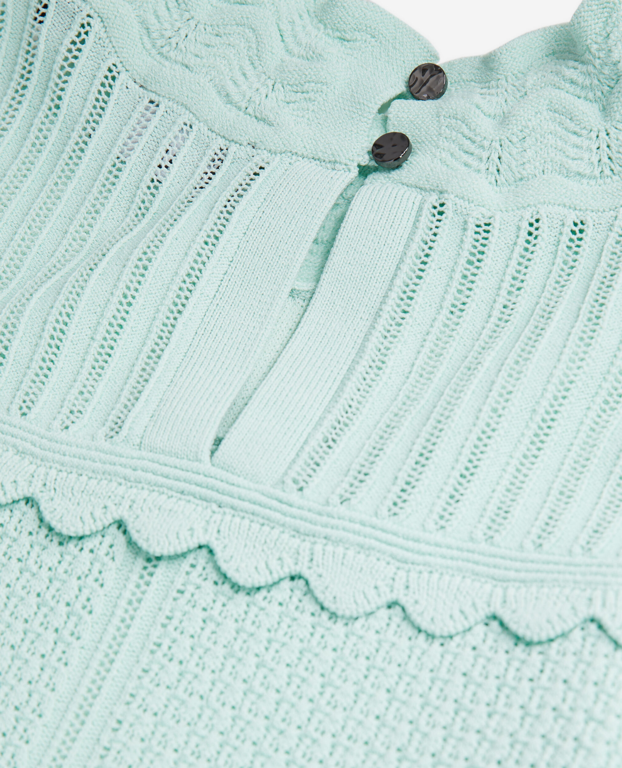 Cropped almond green sweater in openwork knit