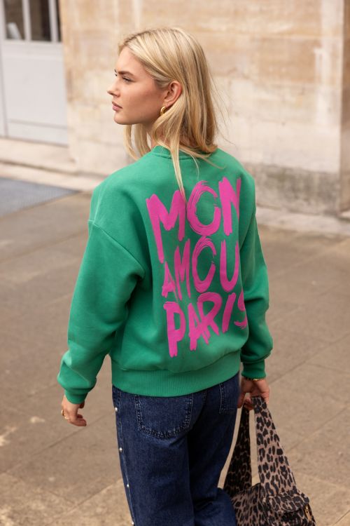 Groene sweater met roze 