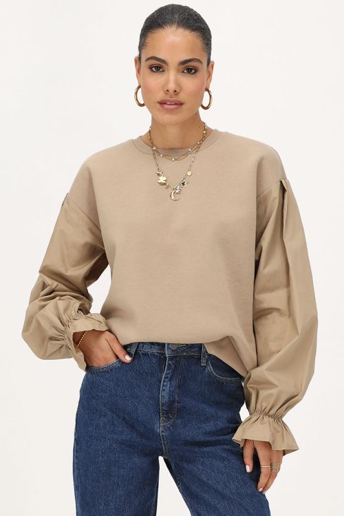 Beige sweater met poplin mouwen