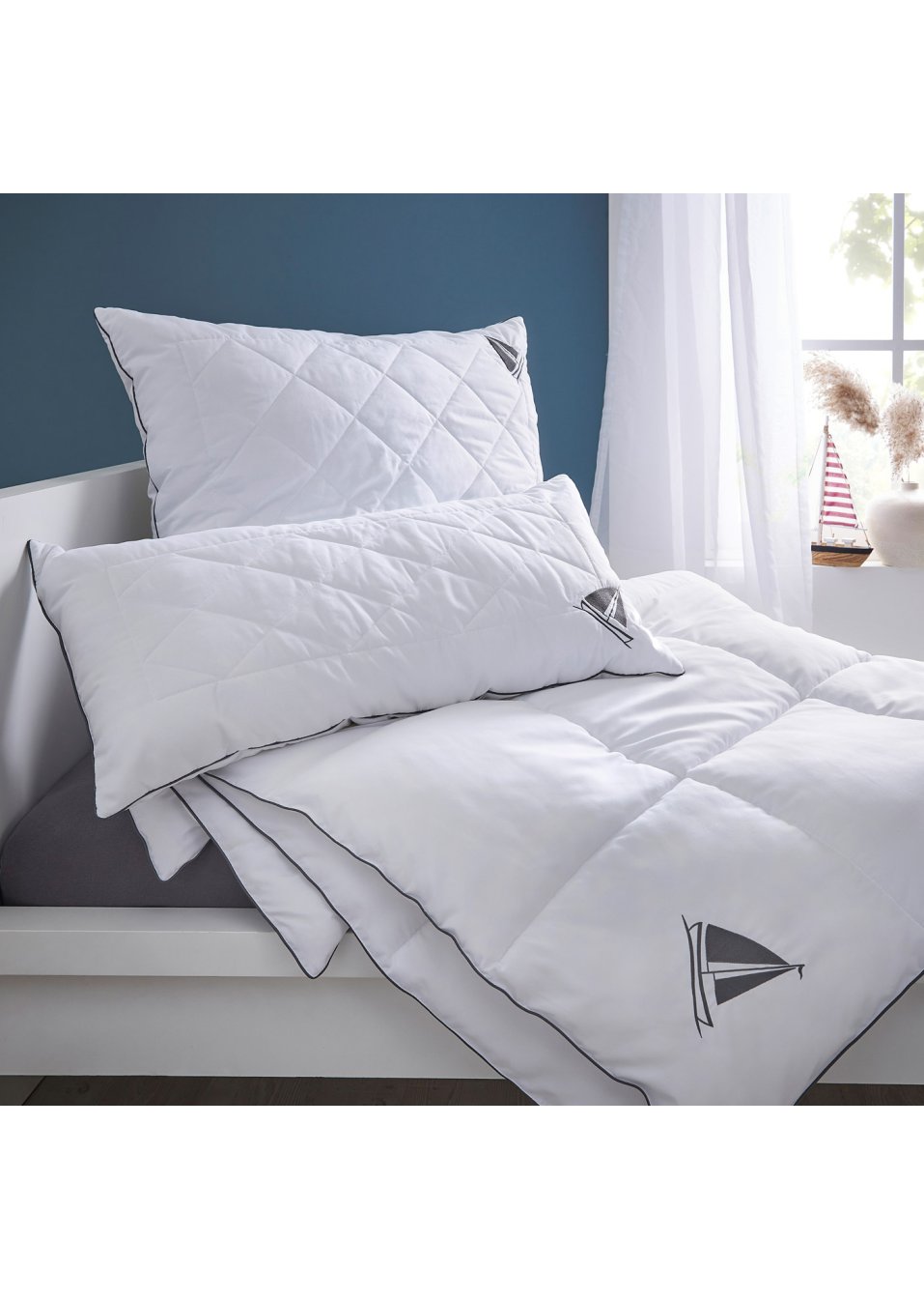 Couette toucher duvet modérée