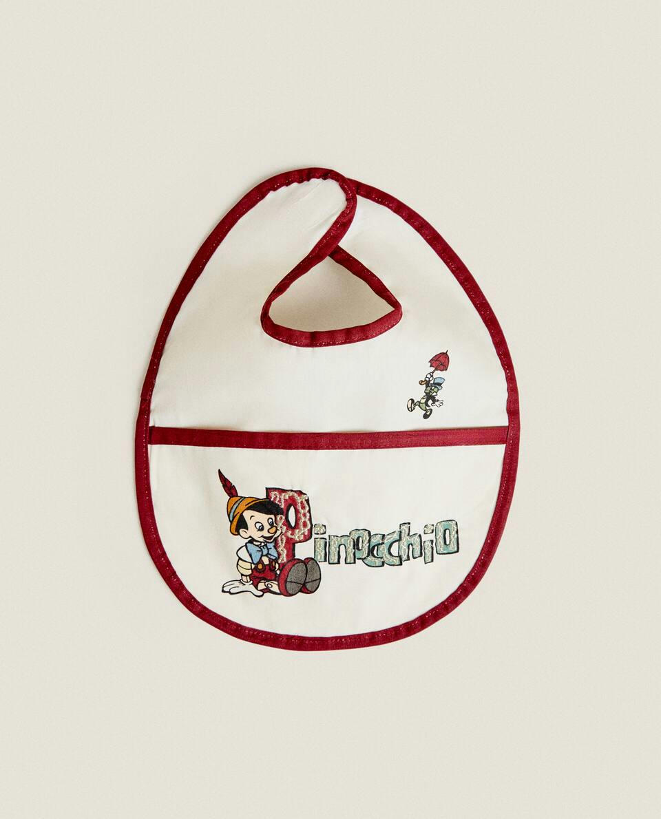 BABADOR INFANTIL DE NATAL DO PINÓQUIO DA DISNEY, REVESTIDO DE RESINA