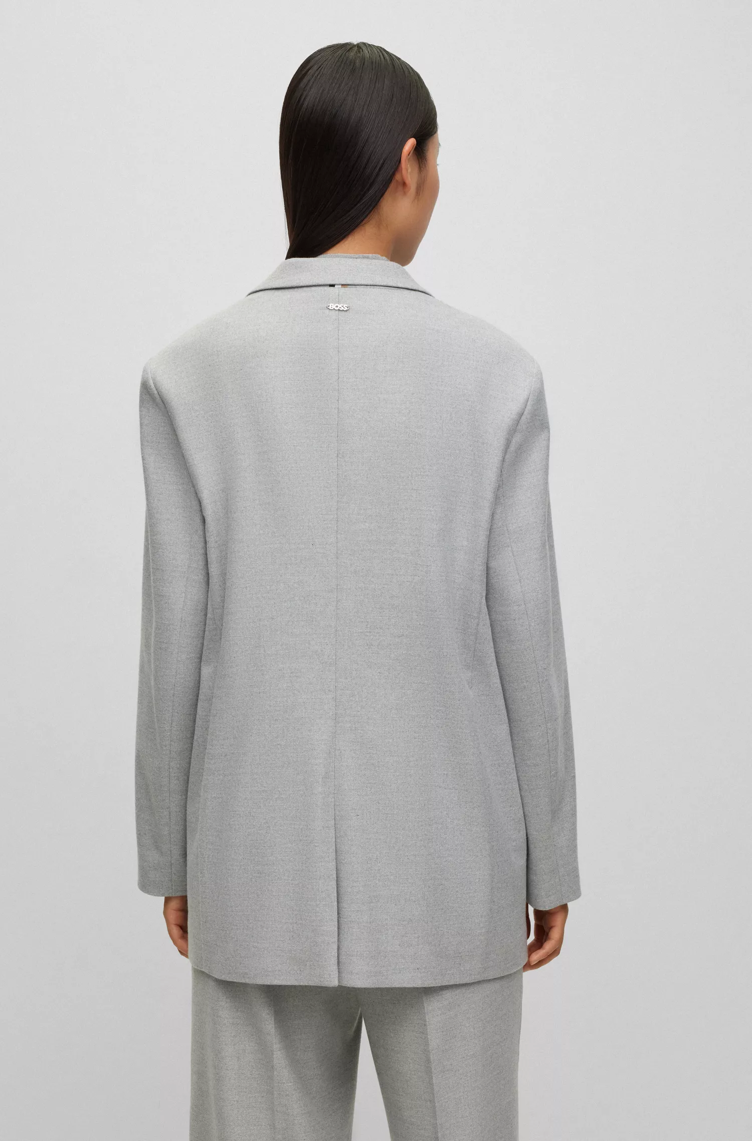 Jaqueta BOSS preta de modelagem oversized com um botão em flanela mesclada.