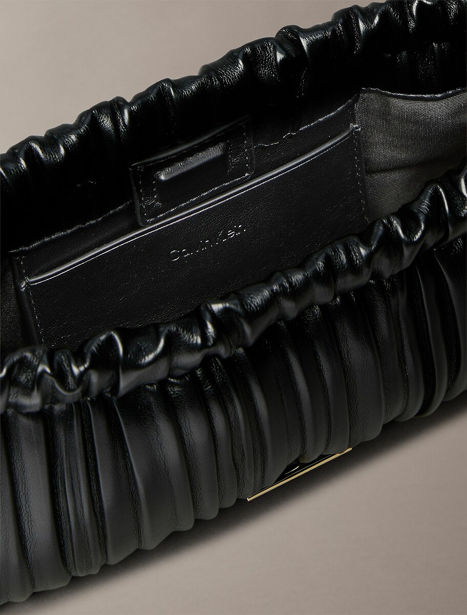 CALVIN KLEIN<br>Mini bolsa de ombro plissada