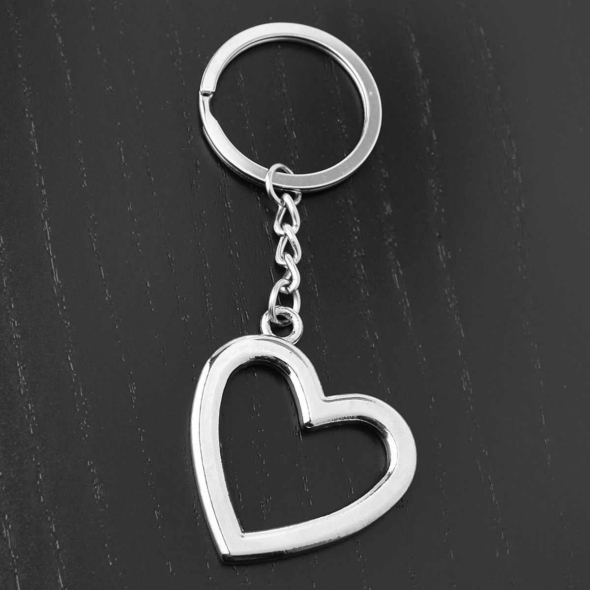 Porte-clés coeur ajouré argenté