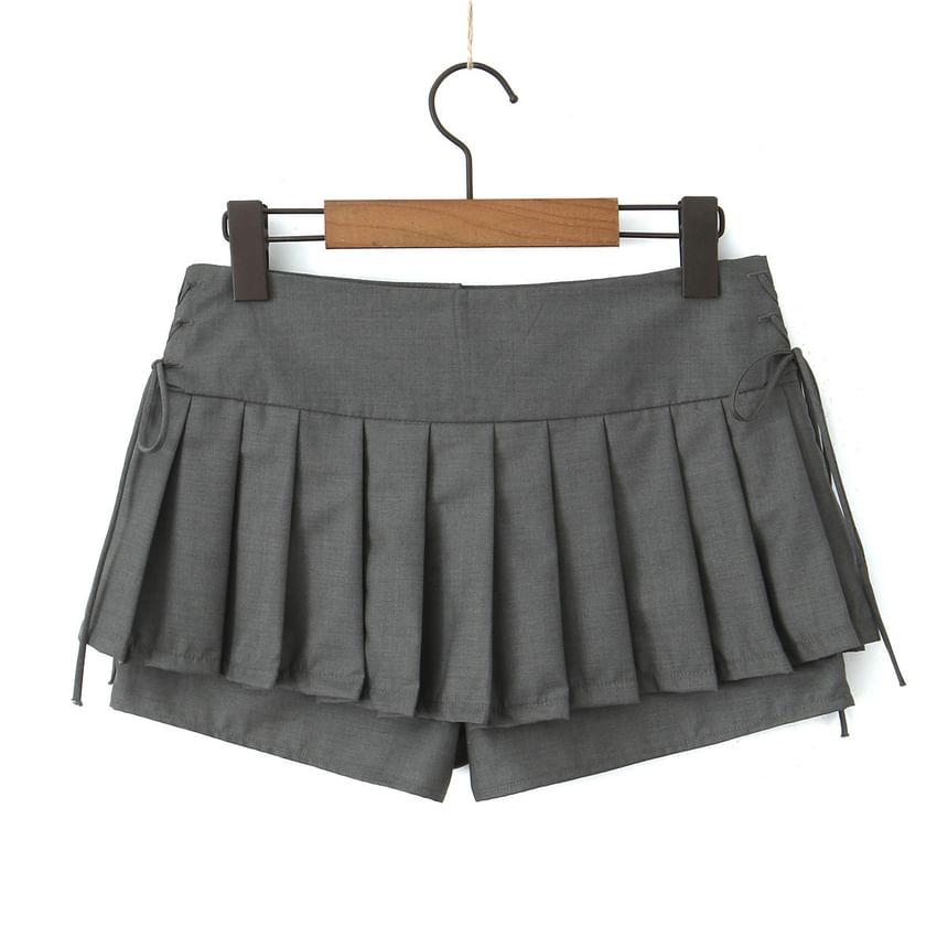Asiris - Lage taille, vetersluiting, effen mini geplooide skorts