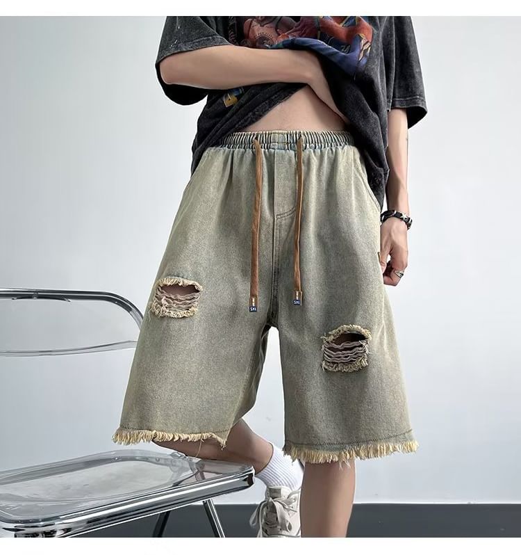 Femilina - Mid Rise Washed Distressed Denim Shorts