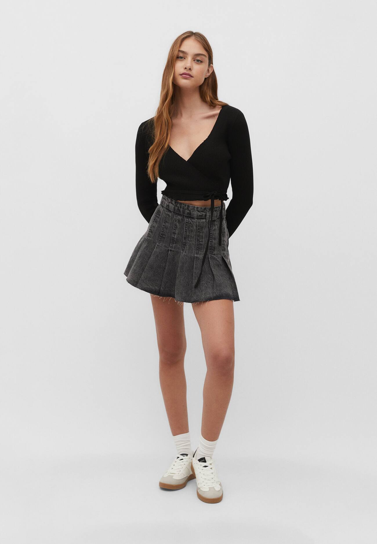 Minissaia jeans com pregas